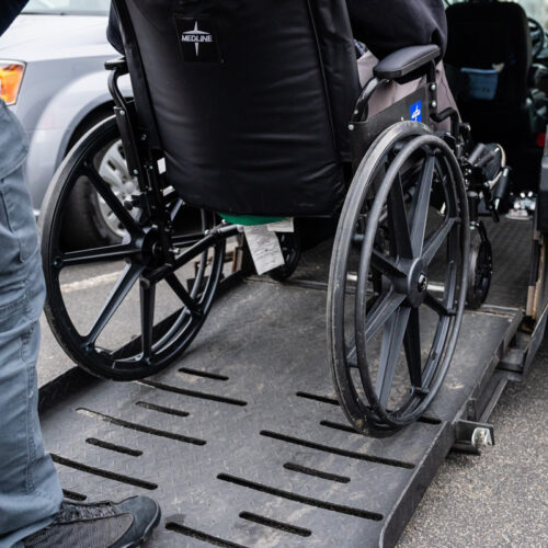 a wheelchair on a ramp of a van