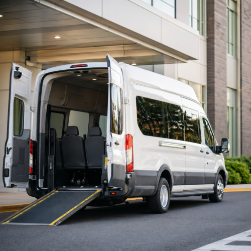 Wheelchair-accessible medical transport van outside a healthcare building in Northern Virginia