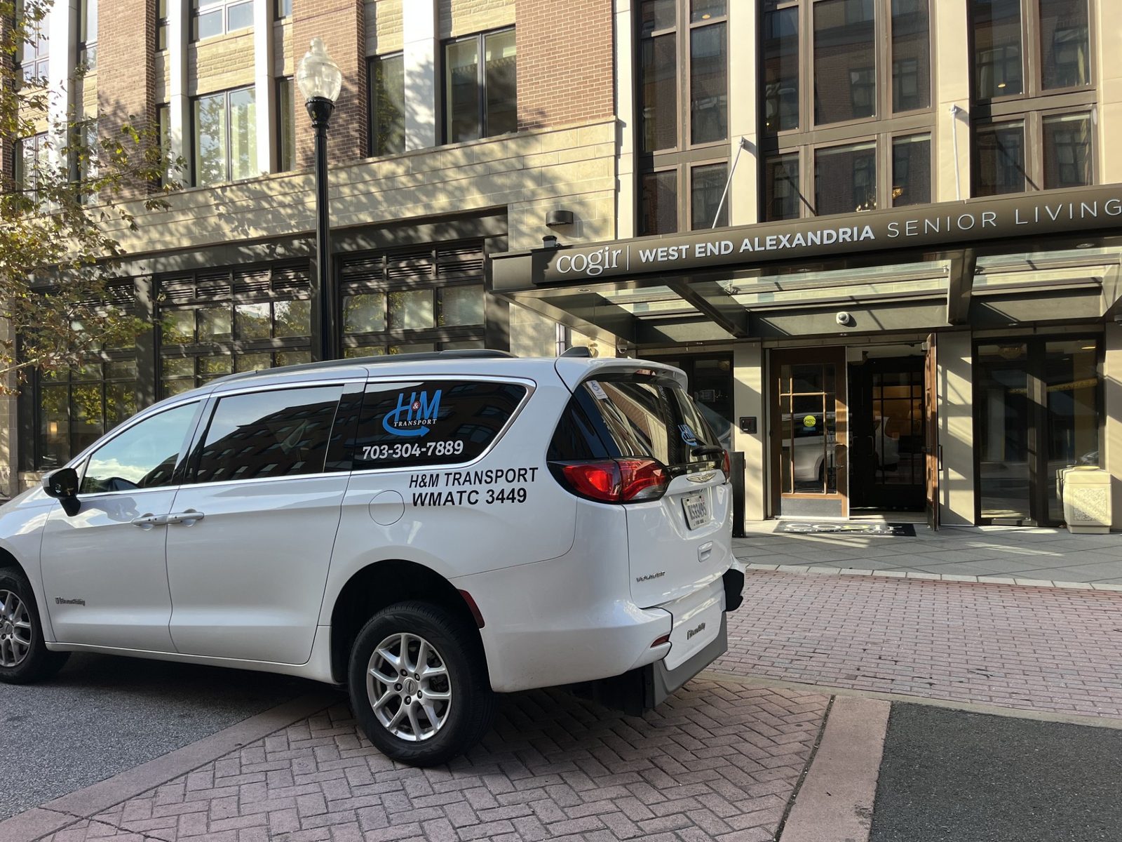 H&M Transport van collecting a resident from Cogir West Alexandria senior living in Alexandria, Virginia