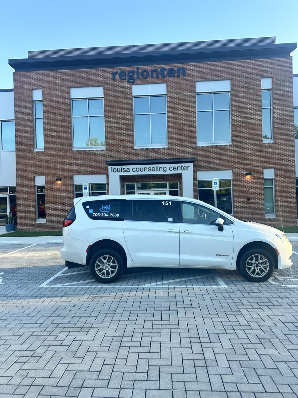 H&M Transport van at a counseling center for a scheduled behavioral health appointment