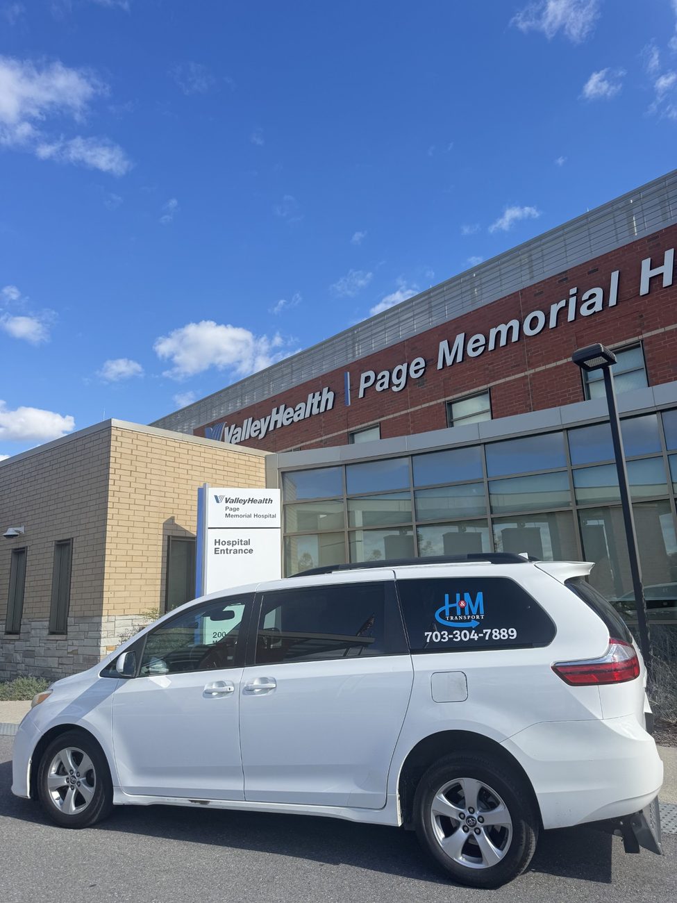 H&M Transport van at Valley Health Page Memorial Hospital on a long-distance run